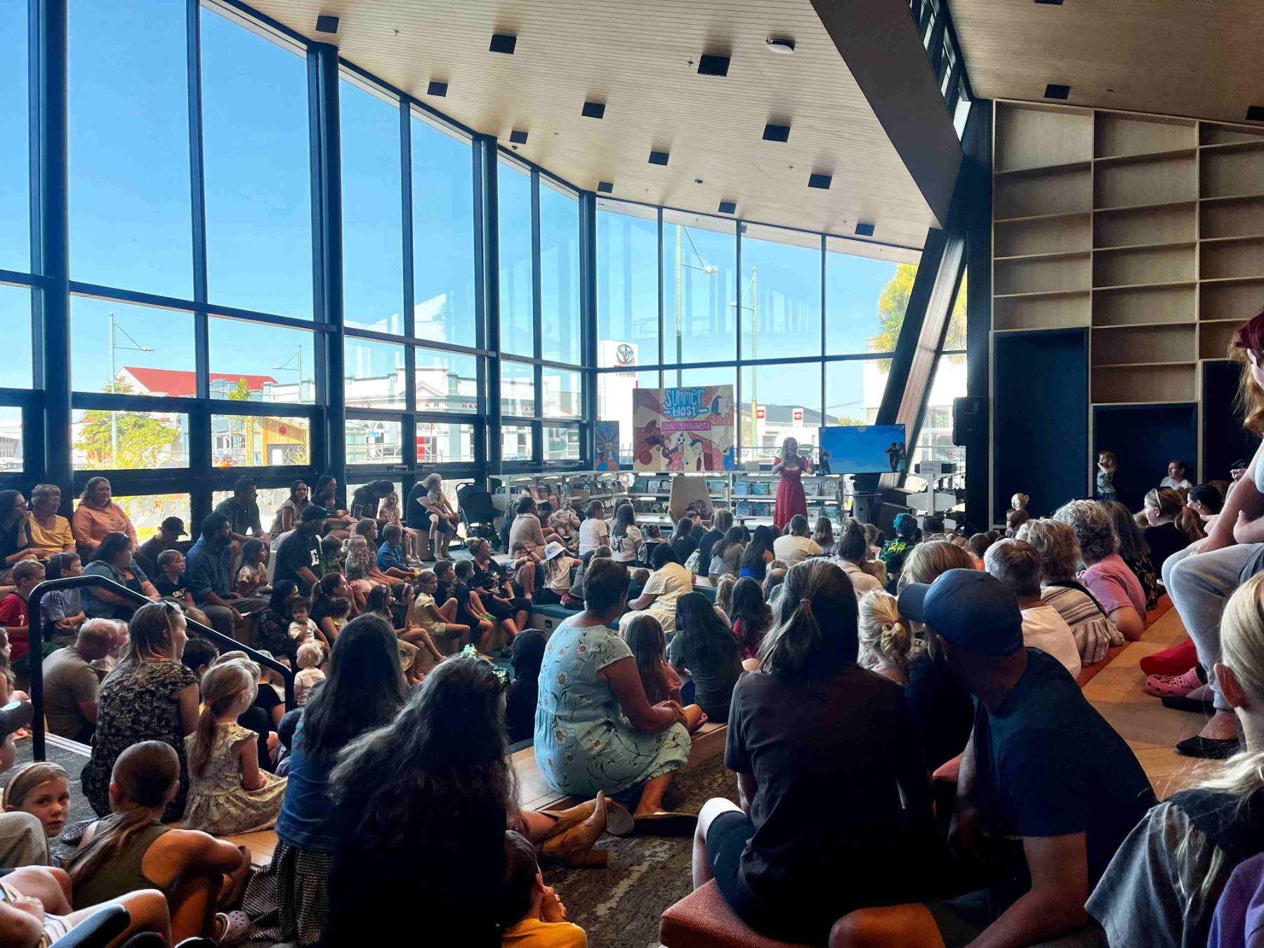 A packed audience enjoys a Suzy Cato presentation.
