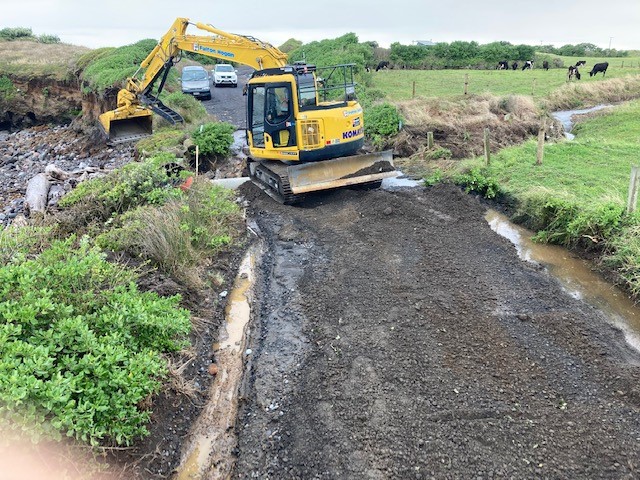 Road crews fixing Stent Road